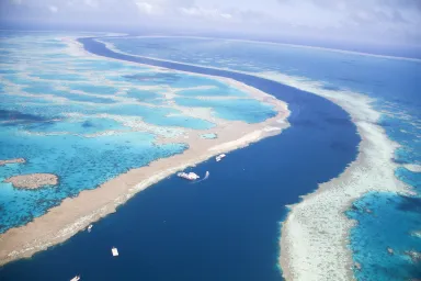 Hardy and Hook Reef with ships in tidal channel